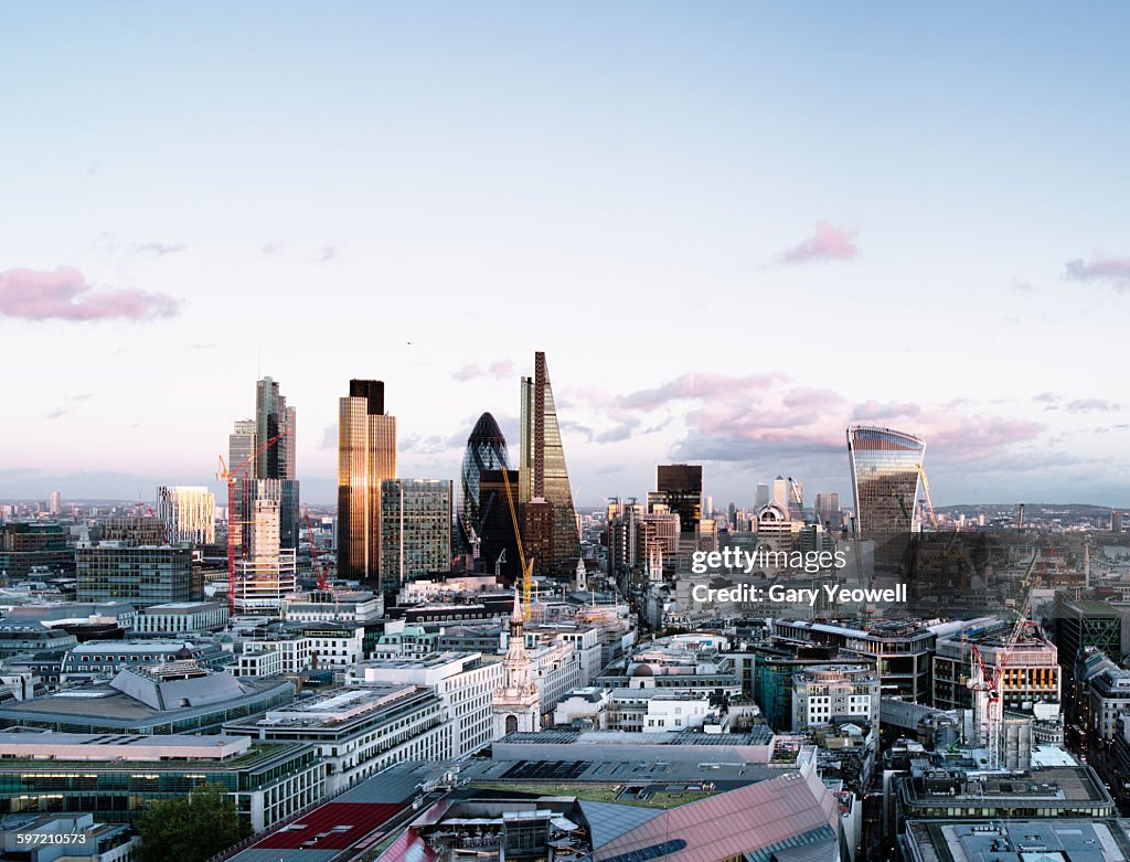 Elevated view over London City skyline at sunset