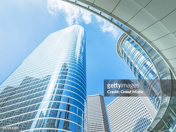 skyscrapers with blue sky background in houston - houston texas stock pictures, royalty-free photos & images