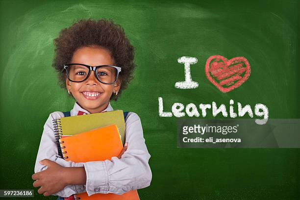 little student girl - english culture stock pictures, royalty-free photos & images
