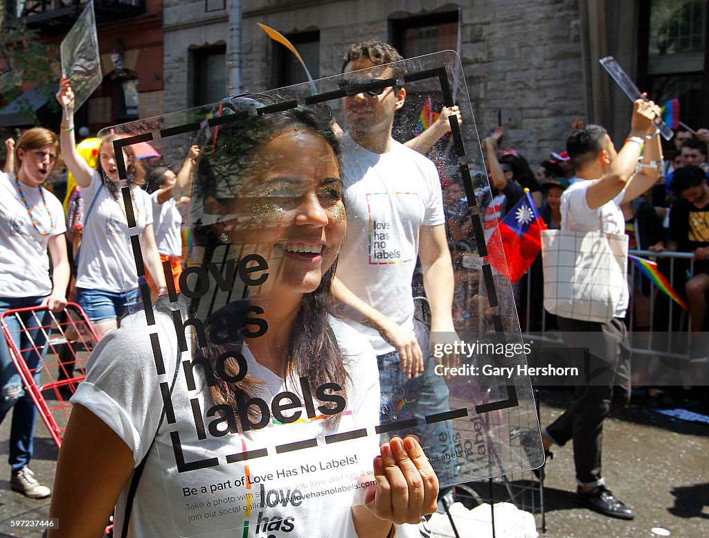 Participants march in the annual Gay Pride Parade in New York