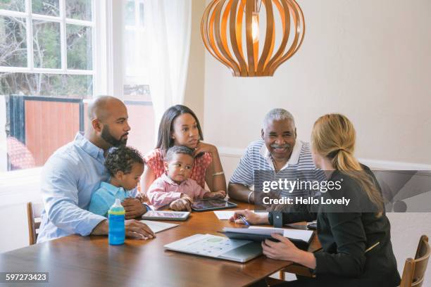 financial advisor talking to clients - customer profile stock pictures, royalty-free photos & images