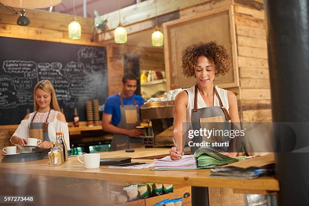 coffee shop accounting - bookie board stock pictures, royalty-free photos & images