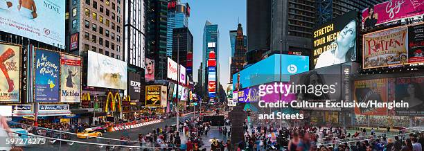 elevated panoramic view of crowds in times square, new york, usa - cultura americana stock pictures, royalty-free photos & images