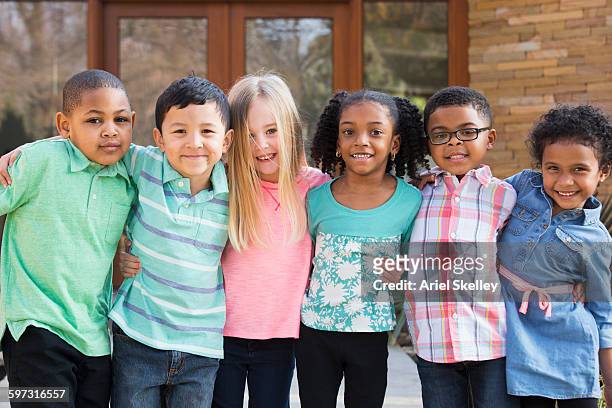 children smiling outdoors - children only stock pictures, royalty-free photos & images