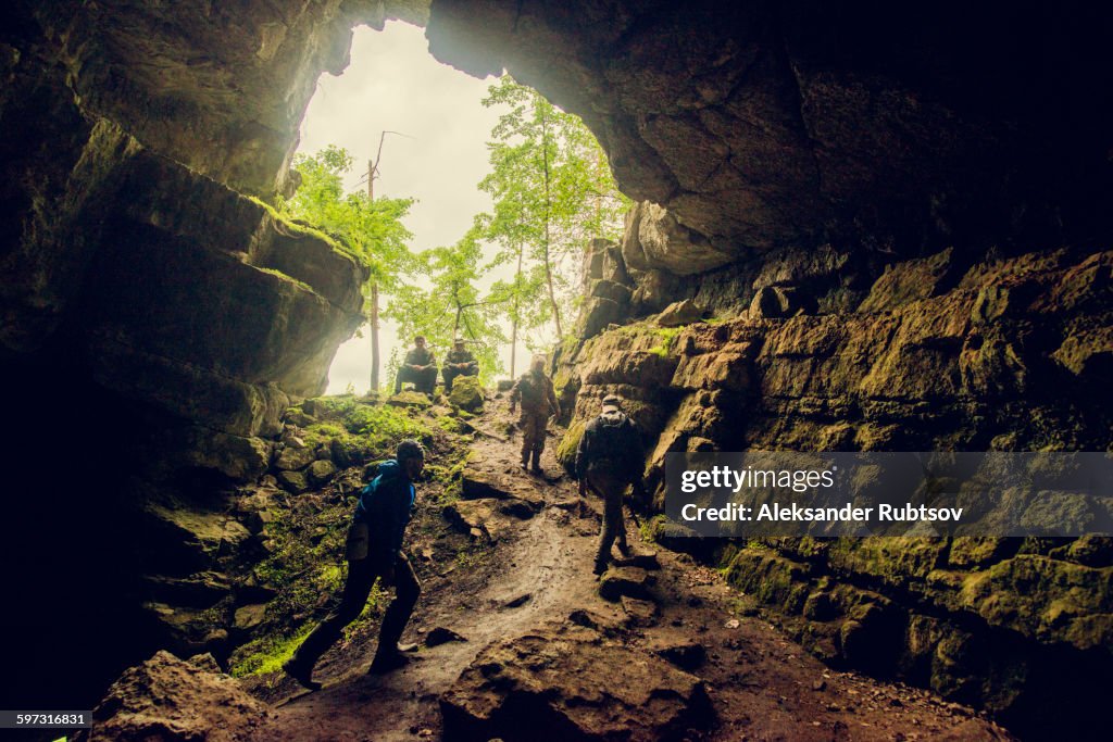 People Exploring Rocks Hikers Exploring Rock Cave High-Res Stock Photo - Getty Images