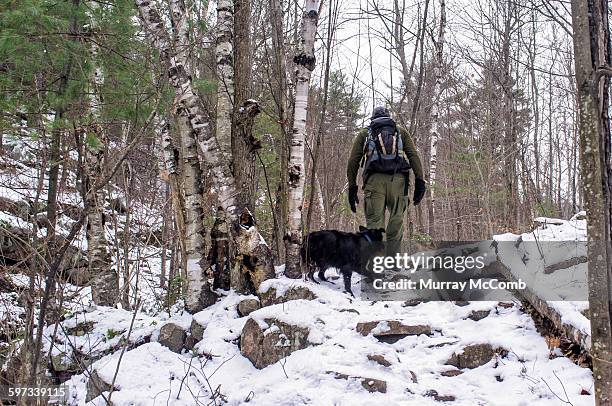 hiking up into winter conditions - murray mccomb stock pictures, royalty-free photos & images