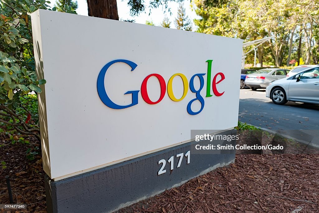 Googie Signage Lettering Signage in a wooded area featuring a Google logo, at the Googleplex ...