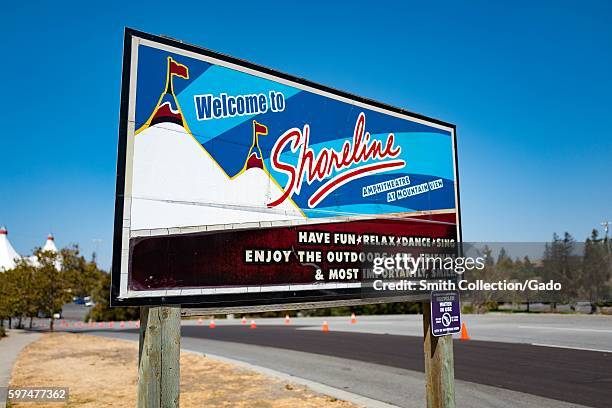 Welcome signage for the Shoreline Amphitheatre, a popular concert venue in the Silicon Valley town of Mountain View, California, with tented roof of...