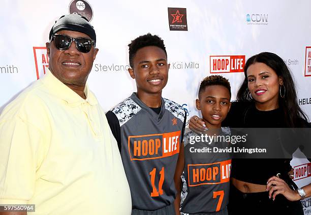 Recording artist Stevie Wonder, sons Kailand Morris and Mandla Morris, and designer Kai Milla attend the 4th Annual Kailand Obasi Hoop-Life...