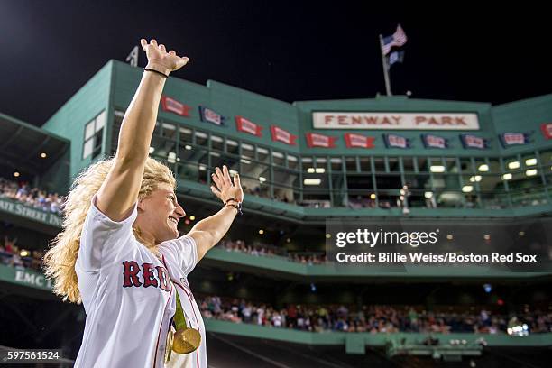 Olympic gold medal Judo fighter Kayla Harrison is introduced before throwing out a ceremonial first pitch before a game between the Boston Red Sox...