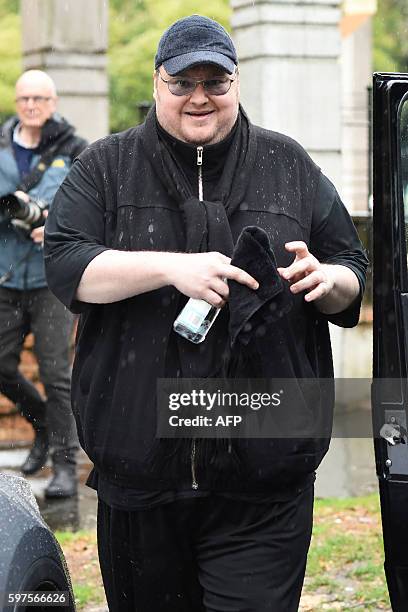 Internet mogul Kim Dotcom leaves following his extradition appeal at the High Court in Auckland on August 29, 2016. Internet mogul Kim Dotcom...