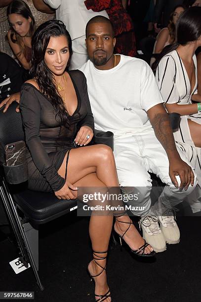 Kim Kardashian West and Kanye West sit in the audience at the 2016 MTV Video Music Awards at Madison Square Garden on August 28, 2016 in New York...