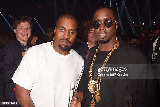 Kanye West and Sean Diddy Combs pose backstage during the 2016 MTV Video Music Awards at Madison Square Garden on August 28, 2016 in New York City.