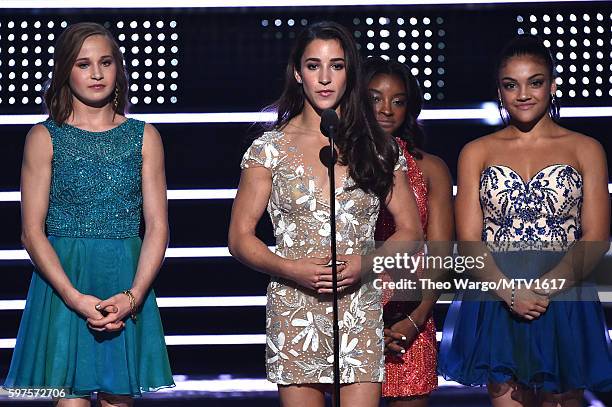 Madison Kocian, Aly Raisman, Simone Biles and Laurie Hernandez present Best Female Video onstage during the 2016 MTV Video Music Awards at Madison...