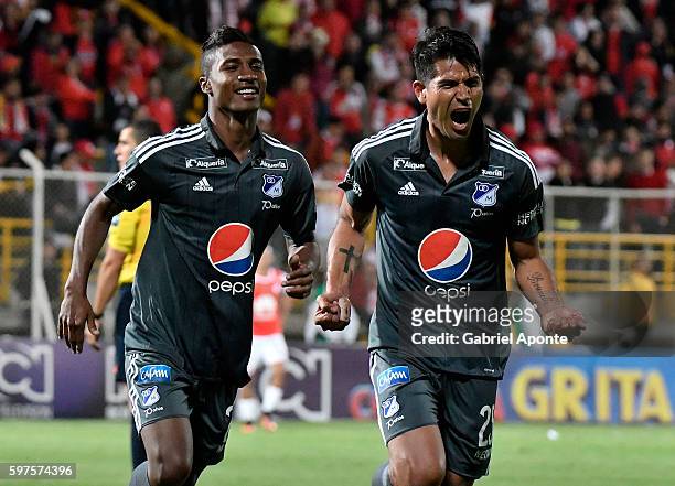 Enzo Gutierrez of Millonarios celebrates after scoring the second goal of his team during a match between Independiente Santa Fe and Millonarios as...