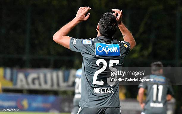 Enzo Gutierrez of Millonarios celebrates after scoring the second goal of his team during a match between Independiente Santa Fe and Millonarios as...