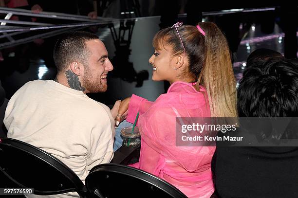 Mac Miller and Ariana Grande share a moment in the audience during the 2016 MTV Video Music Awards at Madison Square Garden on August 28, 2016 in New...