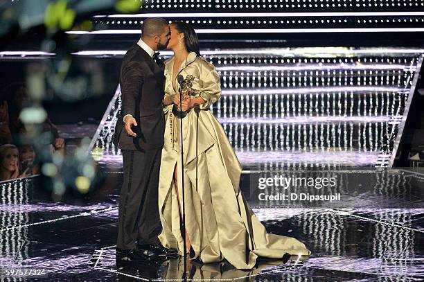 Drake presents an award to Rihanna onstage during the 2016 MTV Music Video Awards at Madison Square Garden on August 28, 2016 in New York City.