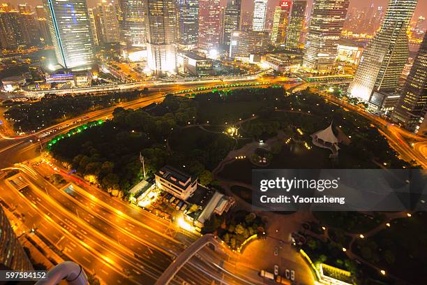 arial view of park around by modern business building at shanghai china - arial city stock pictures, royalty-free photos & images