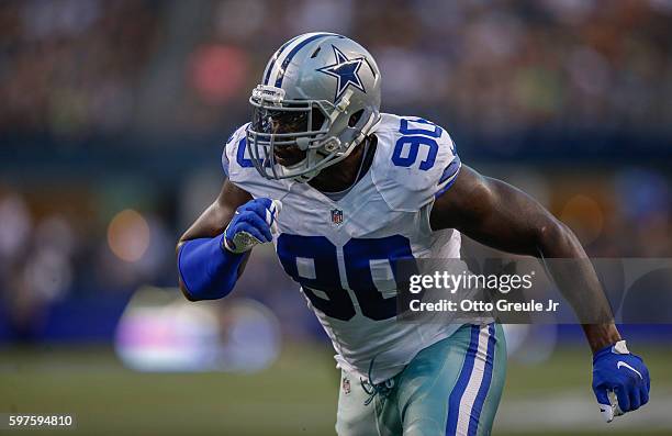 Defensive end DeMarcus Lawrence of the Dallas Cowboys in action against the Seattle Seahawks during the preseason game at CenturyLink Field on August...