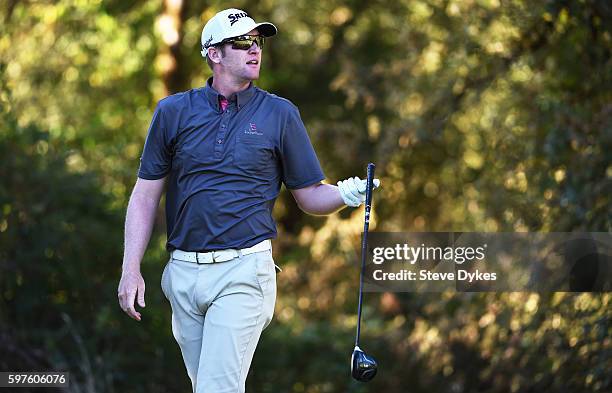 Ryan Brehm watches his drive on the 14th hole during the final round of the WinCo Foods Portland Open at Pumpkin Ridge Witch Hollow on August 28,...