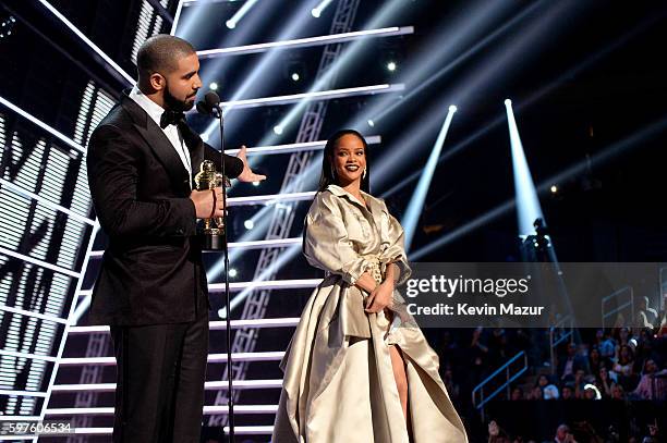 Rapper Drake and singer Rihanna speak onstage during the 2016 MTV Music Video Awards at Madison Square Garden on August 28, 2016 in New York City.