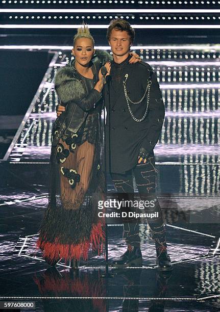 Rita Ora and Ansel Elgort speak onstage during the 2016 MTV Music Video Awards at Madison Square Garden on August 28, 2016 in New York City.