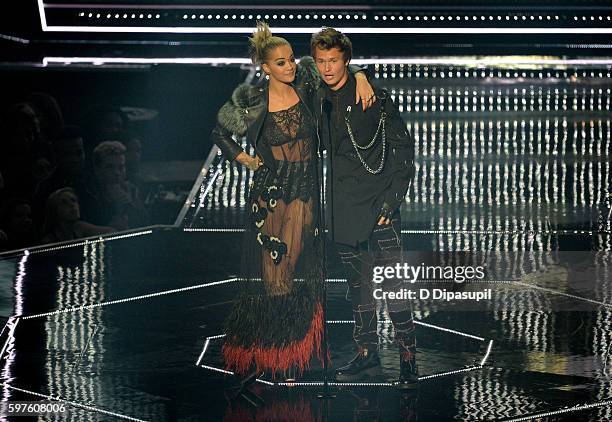 Rita Ora and Ansel Elgort speak onstage during the 2016 MTV Music Video Awards at Madison Square Garden on August 28, 2016 in New York City.