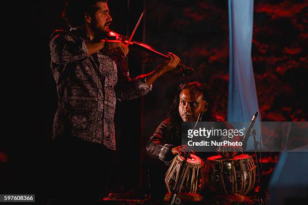 Jorge Guillen, violin, and Nantha Kumar, percussion, perform with Ara Malikian during the cultural summer nights at Cathedral square in Zamora,...