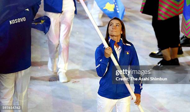 Flag bearer Majlinda Kelmendi of Kosovo enters the stadium during the Opening Ceremony of the Rio 2016 Olympic Games at Maracana Stadium on August 5,...