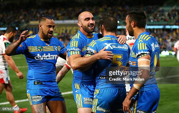 Michael Gordon of the Eels celebrates a try he scored during the round 25 NRL match between the Parramatta Eels and the St George Illawarra Dragons...