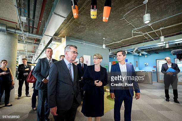 German Interior Minister Thomas de Maiziere tours the Berlin office of Facebook on August 29, 2016 in Berlin, Germany. The German government has put...