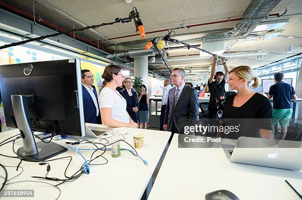 German Interior Minister Thomas de Maiziere tours the Berlin office of Facebook on August 29, 2016 in Berlin, Germany. The German government has put...