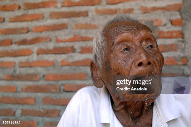 An Indonesian man, named Mbah Gotho, claimed to be 146 years old, is the oldest human in world's history speaks to press members at his family house...