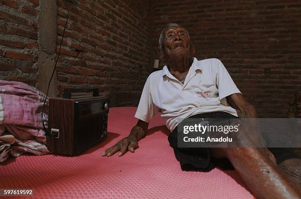 An Indonesian man, named Mbah Gotho, claimed to be 146 years old, is the oldest human in world's history speaks to press members at his family house...