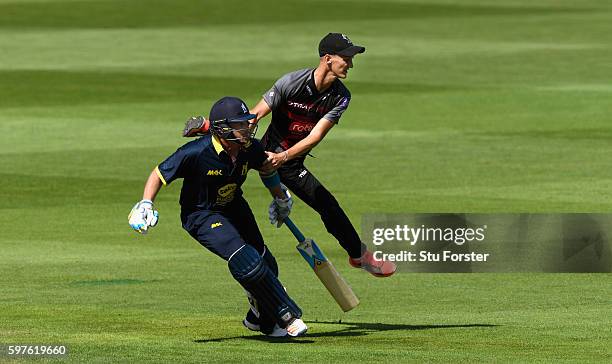 Warwickshire batsman Ian Bell collides with Somerset fielder Max Waller during the Royal London One-Day Cup semi final between Warwickshire and...