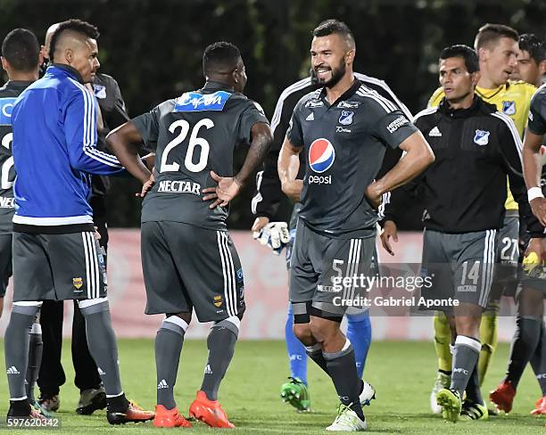 Dairon Asprilla and Andres Cadavid of Millonarios celebrate after a match between Independiente Santa Fe and Millonarios as part of round 10 of Liga...