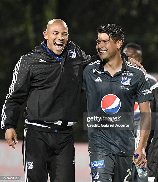 Enzo Gutierrez and teammates of Millonarios celebrate after a match between Independiente Santa Fe and Millonarios as part of round 10 of Liga Aguila...