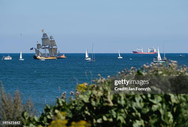 The Russian ship Shtandart sails along the coastline after leaving Blyth harbour during the North Sea Tall Ships Parade of Sail on August 29, 2016 in...