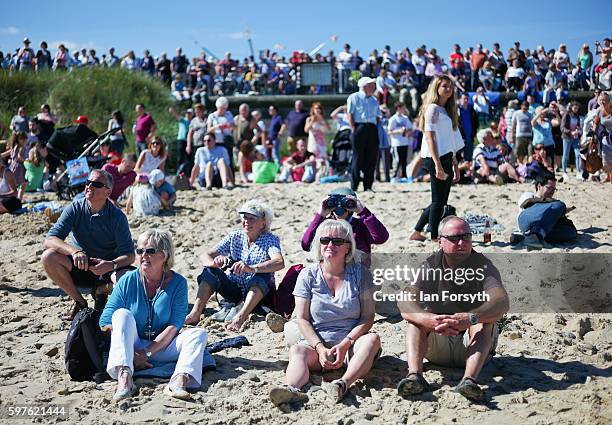 Thousands of spectators line the seafront and beach to watch the North Sea Tall Ships Parade of Sail on August 29, 2016 in Blyth, England. The...