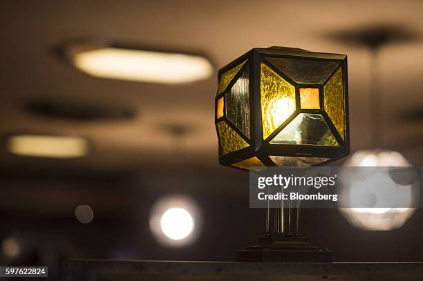 Stained glass light fixture is seen in the lobby of the Imperial Hotel in Tokyo, Japan, on Friday, Aug. 19, 2016. Tokyo's Imperial Hotel, the luxury...