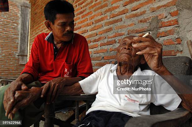 An Indonesian man, named Mbah Gotho, claimed to be 146 years old, is the oldest human in world's history speaks to press members at his family house...