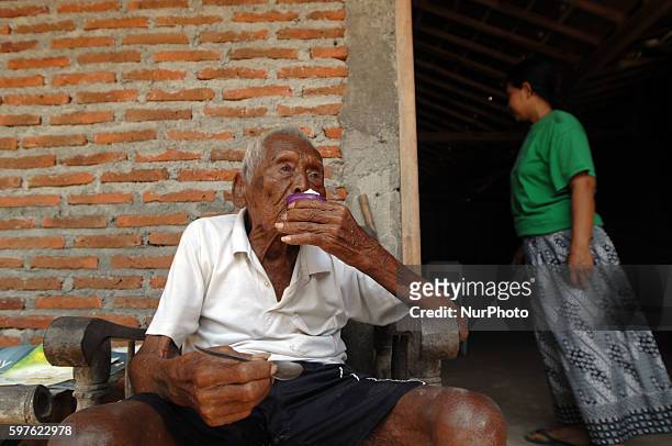 An Indonesian man, named Mbah Gotho, claimed to be 146 years old, is the oldest human in world's history speaks to press members at his family house...