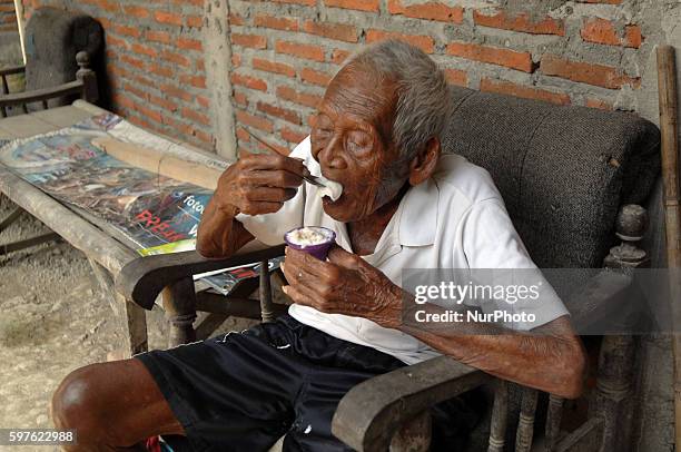 An Indonesian man, named Mbah Gotho, claimed to be 146 years old, is the oldest human in world's history speaks to press members at his family house...