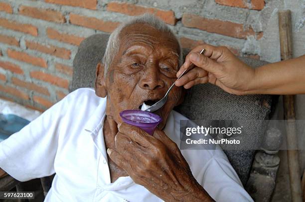 An Indonesian man, named Mbah Gotho, claimed to be 146 years old, is the oldest human in world's history speaks to press members at his family house...