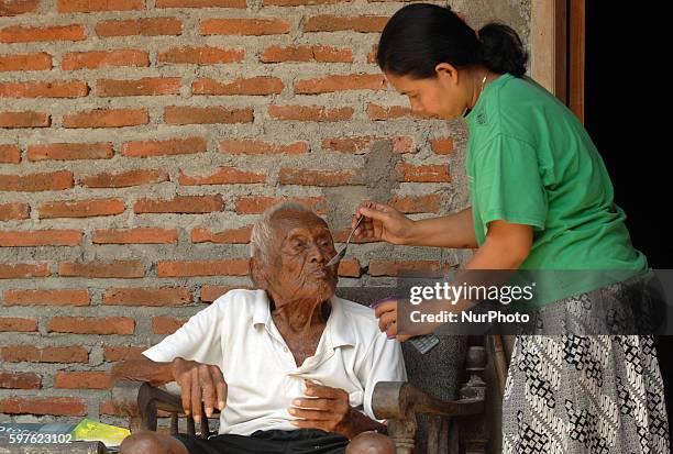 An Indonesian man, named Mbah Gotho, claimed to be 146 years old, is the oldest human in world's history speaks to press members at his family house...