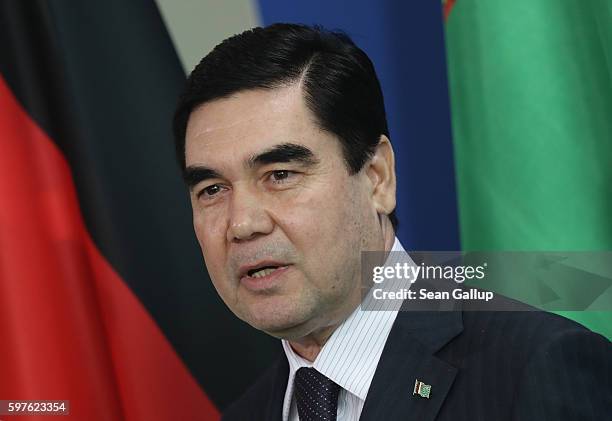 Turkmenistan President Gurbanguly Berdymukhamedov departs after speaking to the media with German Chancellor Angela Merkel following talks at the...