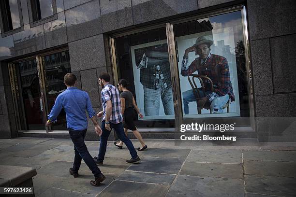 Pedestrians pass in front of a Abercrombie & Fitch Co. Store in New York, U.S., on Friday, Aug. 26, 2016. Abercrombie & Fitch Co. Is scheduled to...