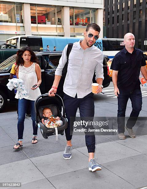 Nicole Johnson, Boomer Phelps and Michael Phelps seen on the streets of Manahttan on August 29, 2016 in New York City.