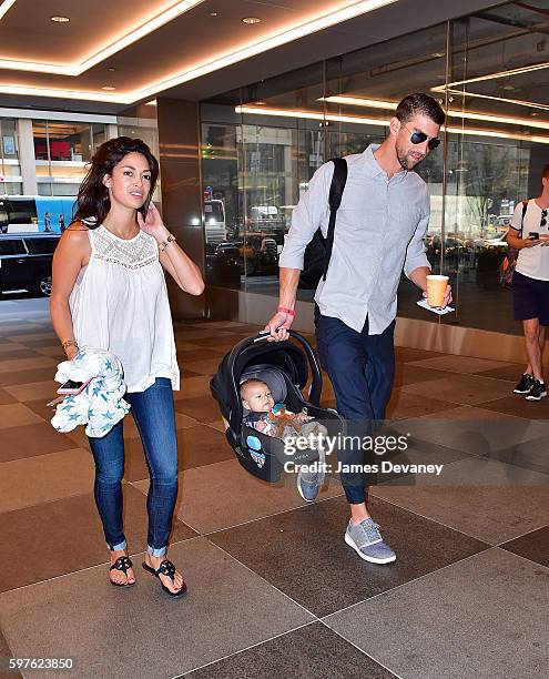 Nicole Johnson, Boomer Phelps and Michael Phelps seen on the streets of Manahttan on August 29, 2016 in New York City.